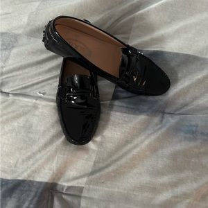 Tod’s black patent leather loafers. Preowned. Great condition